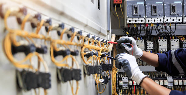 Professional Electrician technician working in Eagle Lake, FL